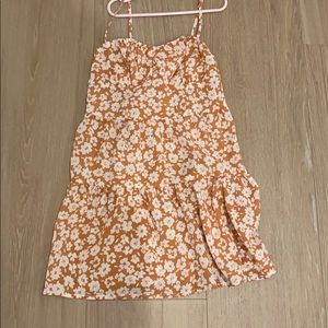 Orange dress with white flowers